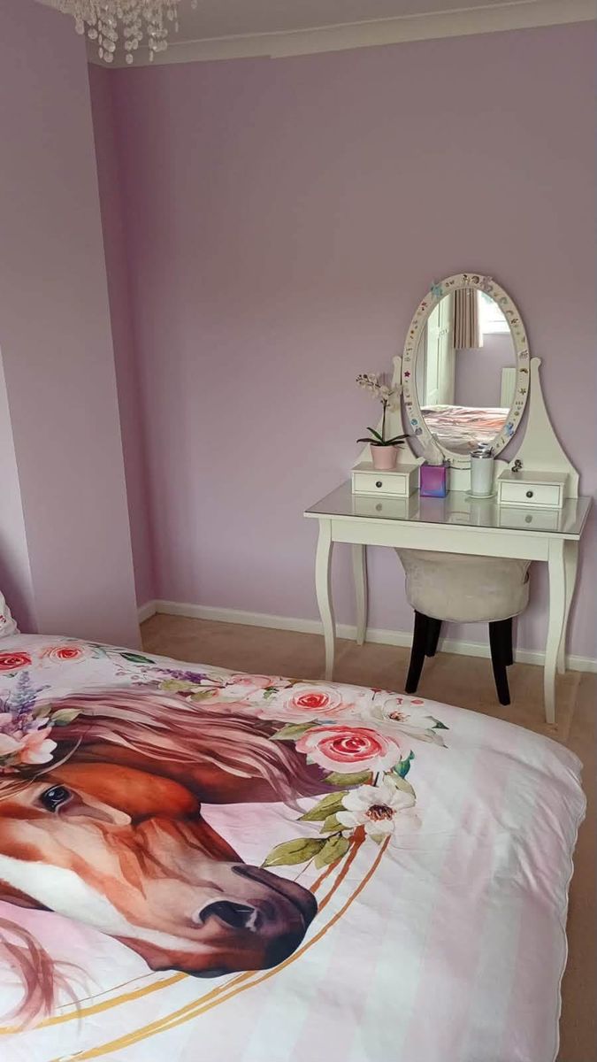 Bedroom painted in soft lilac