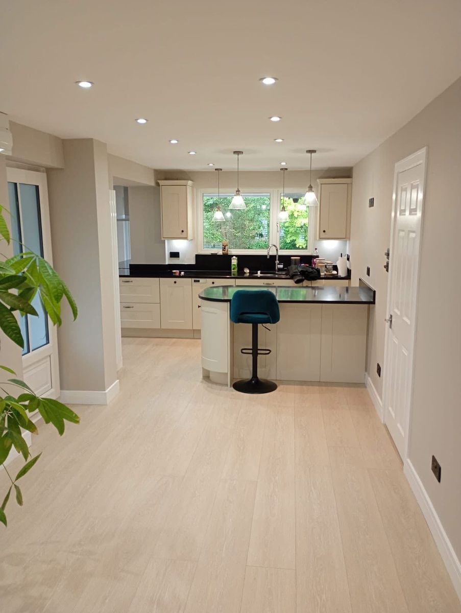 Kitchen and dining area in pale neutral paint