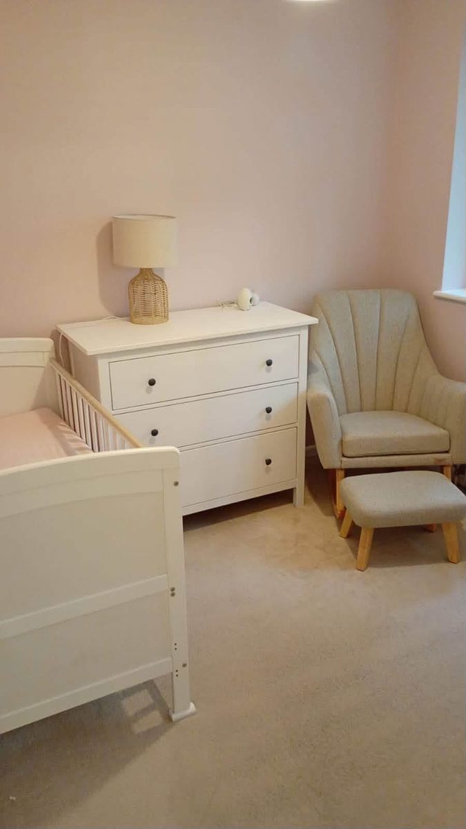 Nursery painted in soft pink