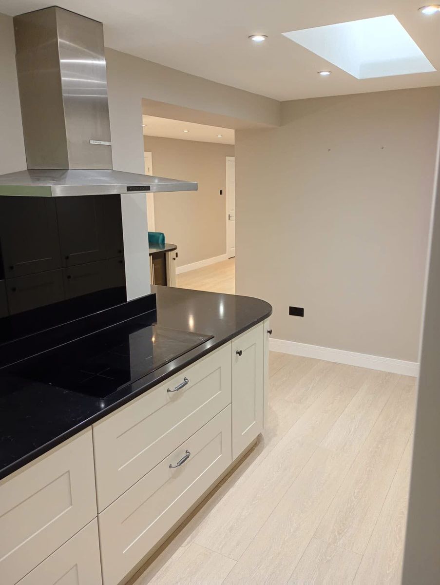 Kitchen with cream units and pale neutral walls